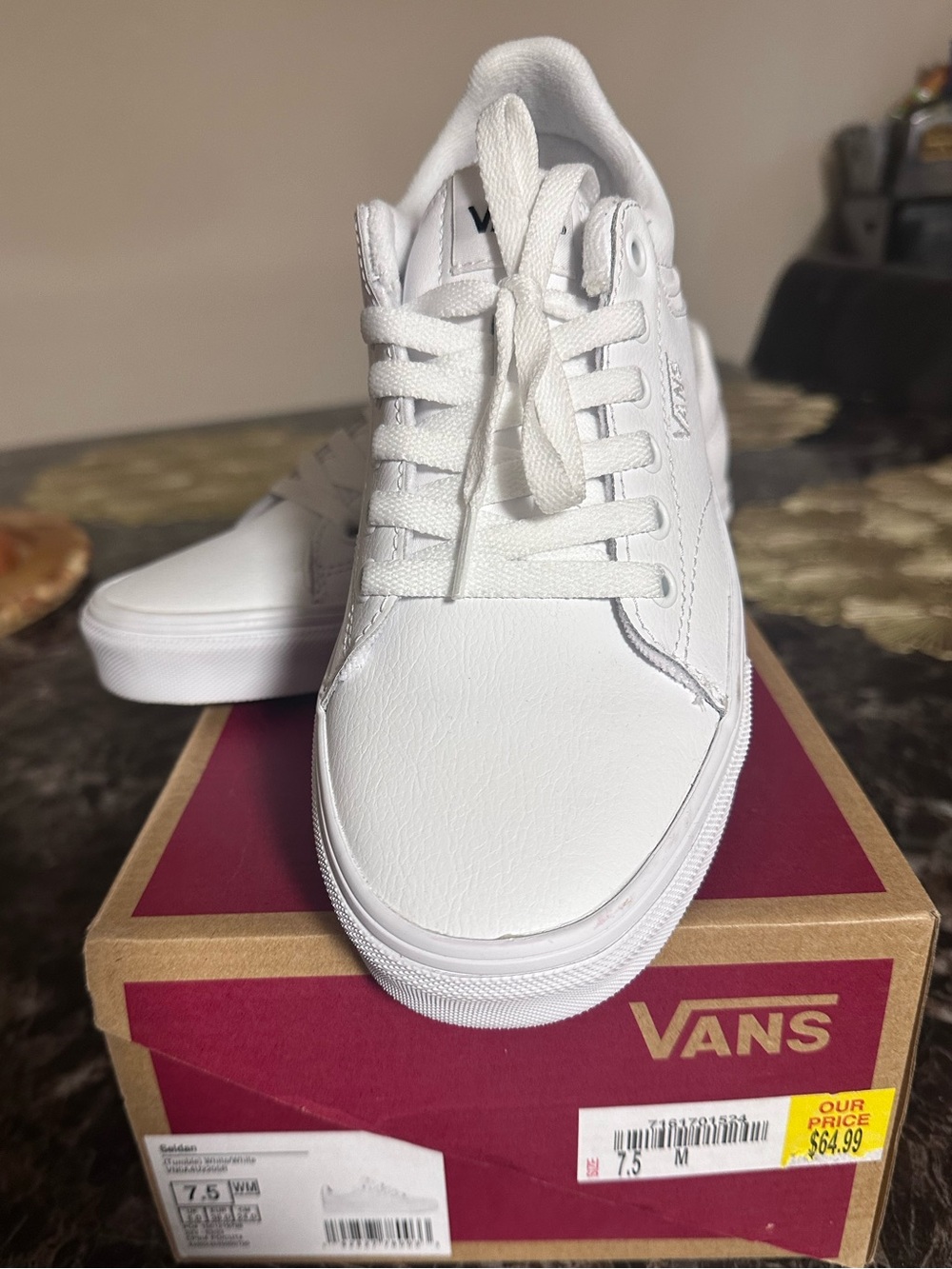 Vans women’s White Low-Top Leather Sneakers